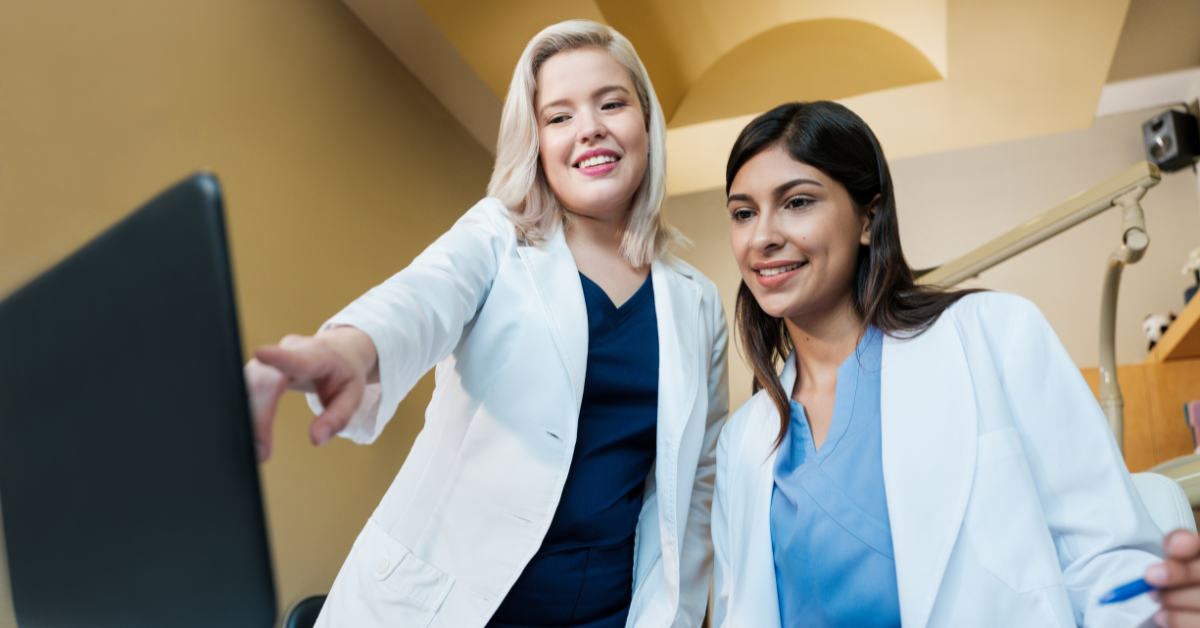 female dentists at computer